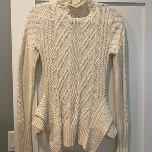 Off white cable knit peplum sweater by BCBG. Size XS. Good condition.
